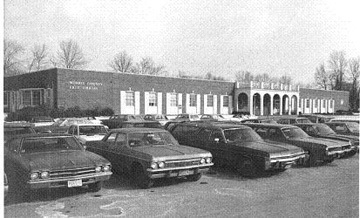 Cars parked in front of the Morris County Library, 1968