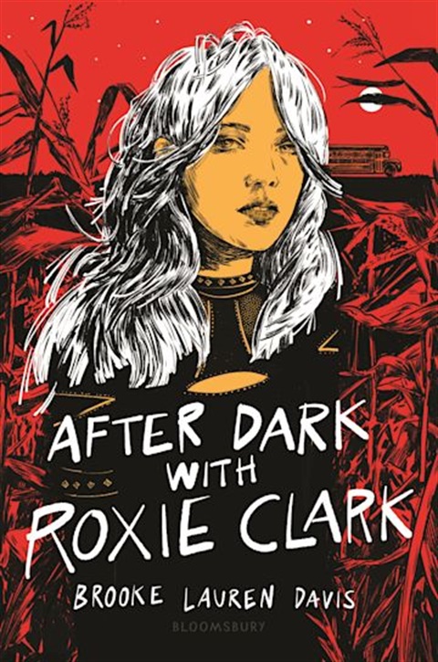After Dark with Roxie Clark Book Cover. A girl in a black shirt stands in front of a field of corn. The sky is red and the text is white, matching the girl's hair.
