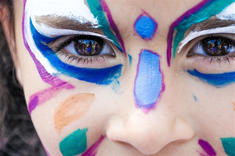 little girl with face painted