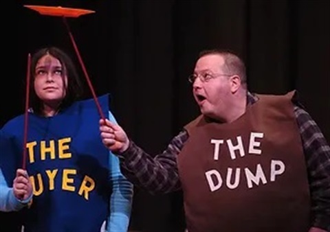 two people dressed as 'the dump' and 'the buyer'