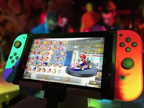 nintendo switch with mario kart on the screen 